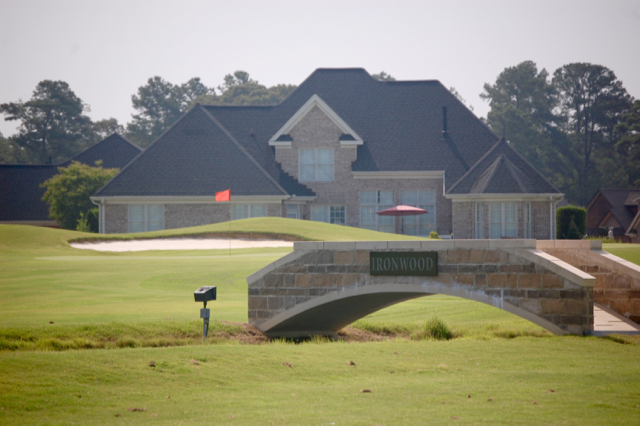 Ironwood home beyond bridge