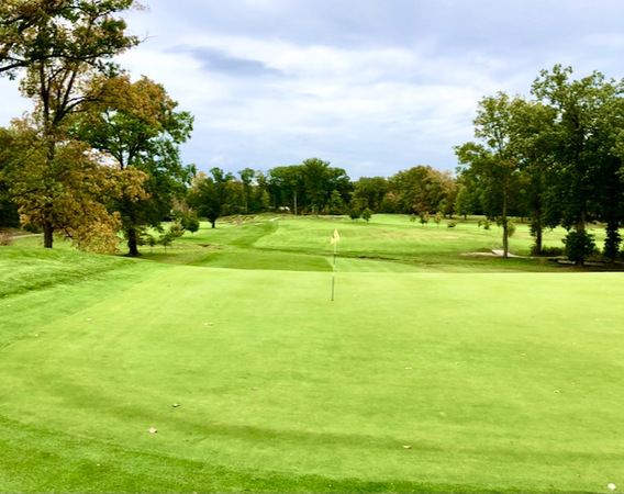 The 15th at Keney Park is a long par 4 with a green that sits on a high hill.  